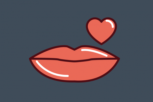 Coral lips and a heart on a dark grey background