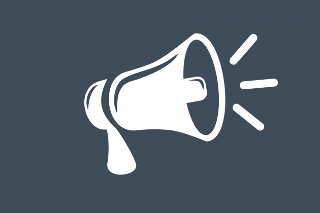 Illustration of a white megaphone on a dark grey background