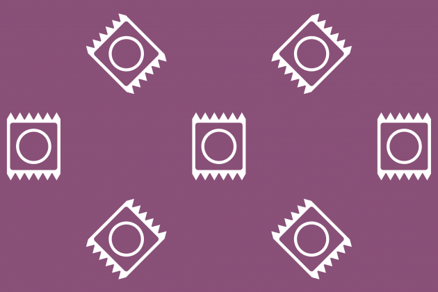 Wrapped condoms on a purple background
