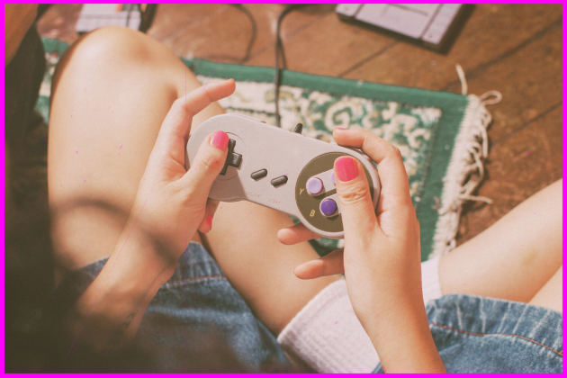 Girl playing retro video game