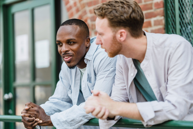 Two men talking