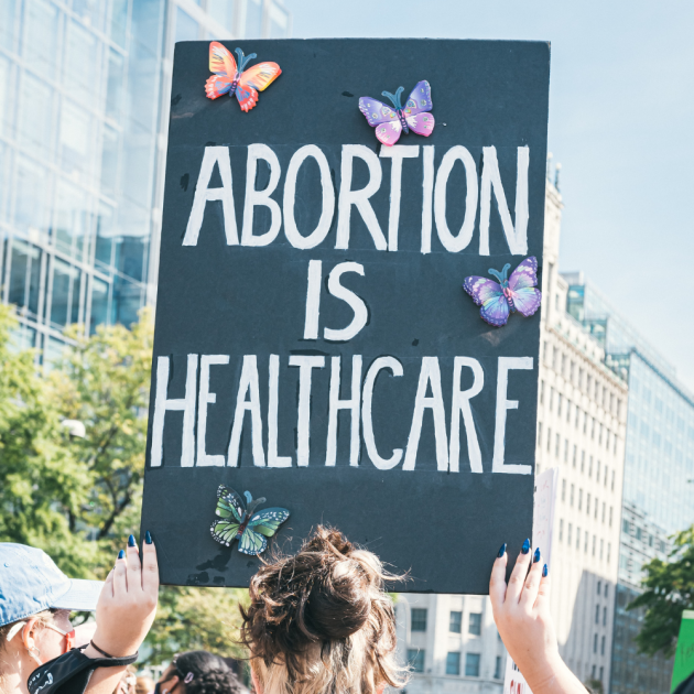 A poster that says "ABORTION IS HEALTHCARE"
